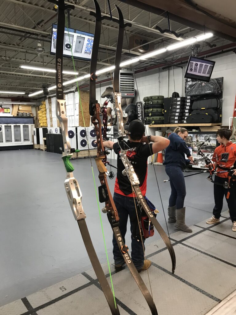 Shooters on the line at XSpot Archery.